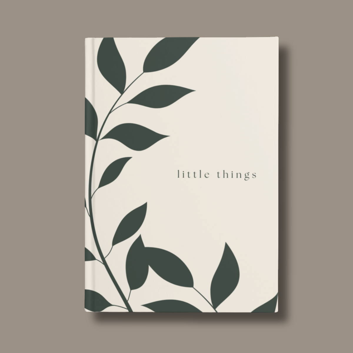 Personalisiertes BOTAN Notizbuch mit individuellem Wunschtext auf dem dunkelgrünen botanischen Hardcover