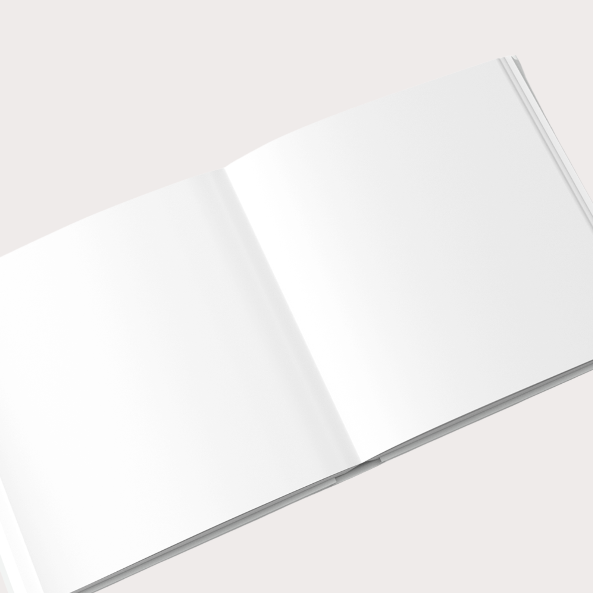 Leere weiße Seiten eines hochwertigen Blankobuchs, ideal zum Einkleben von Fotos oder für handgeschriebene Erinnerungen.