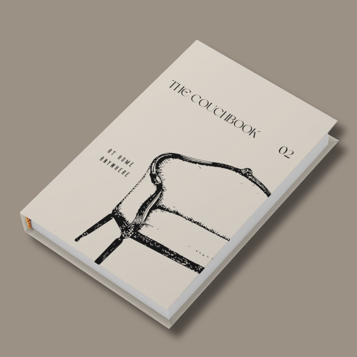 THE COUCHBOOK 02 – Coffee Table Book zum Selbstgestalten mit cremefarbenem Hardcover und schwarzer Stuhlillustration