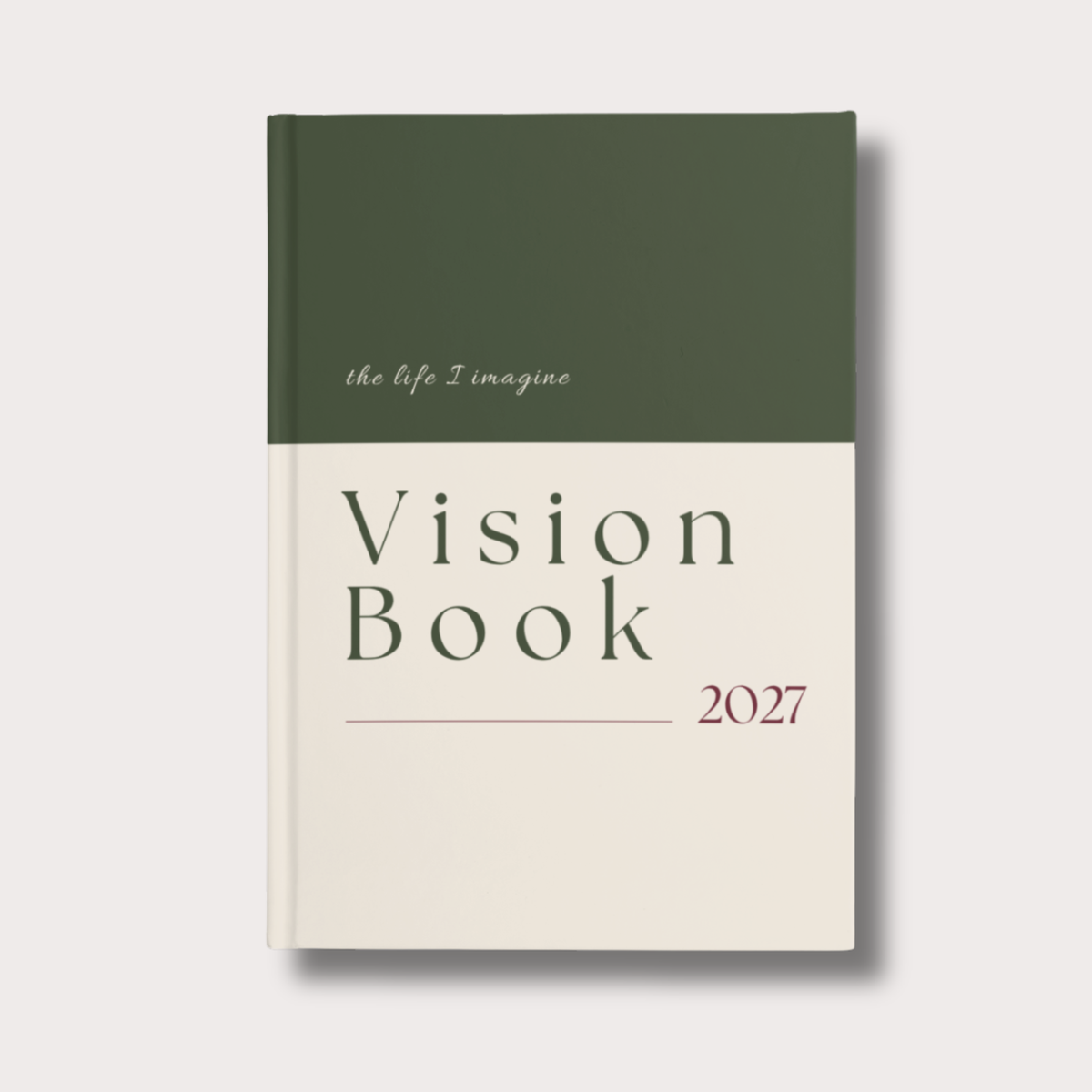 Vision Book 2027 Mira als hochwertiges Hardcover in Waldgrün, Creme und Bordeaux mit dem Schriftzug The Life I Imagine.